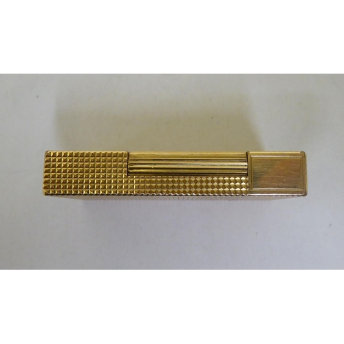 337 - A Dupont gold plated gas lighter, serial no.841EZ60