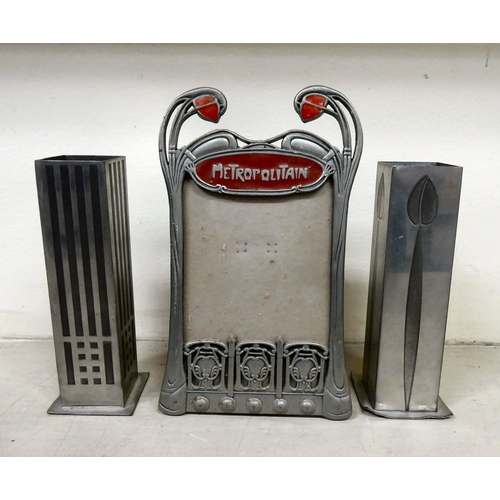 347 - 20thC decorative and functional metalware: to include a pair of Charles Rennie Mackintosh pewter vas... 