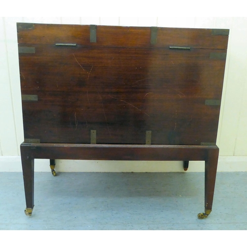 35 - A George III military design, brass bound mahogany and camphorwood chest with straight sides and a h... 