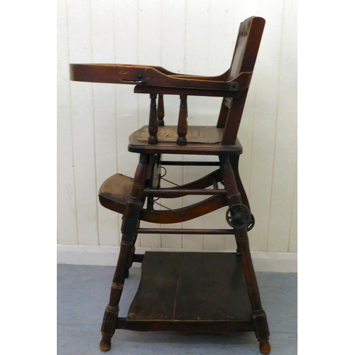 37 - An early 20thC stained beech framed metamorphic high chair