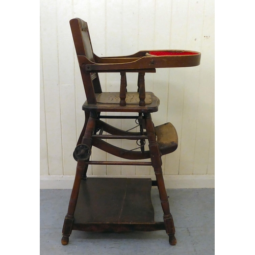 37 - An early 20thC stained beech framed metamorphic high chair