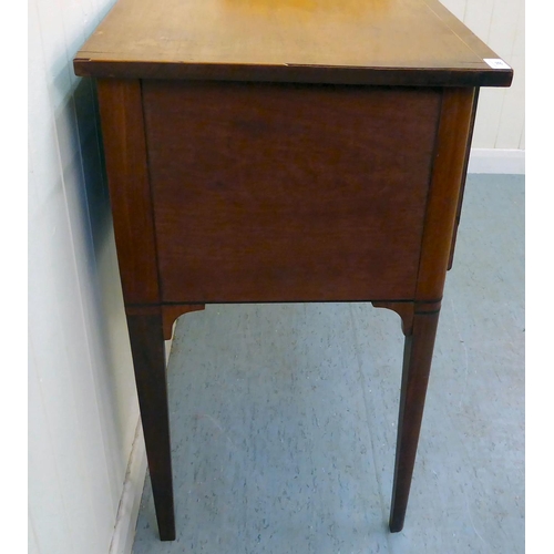 38 - An early 20thC string inlaid mahogany and flame mahogany finished, three drawer kneehole writing des... 