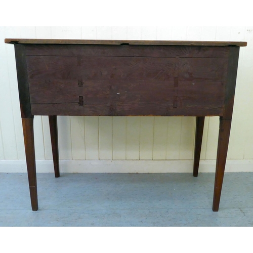 38 - An early 20thC string inlaid mahogany and flame mahogany finished, three drawer kneehole writing des... 