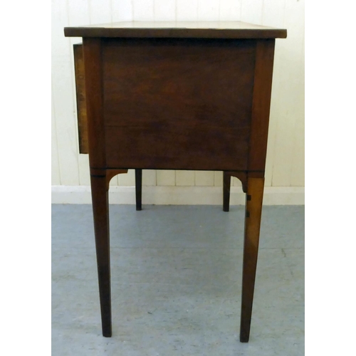 38 - An early 20thC string inlaid mahogany and flame mahogany finished, three drawer kneehole writing des... 