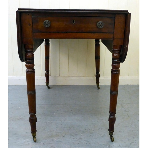 42 - A mid 19thC mahogany Pembroke table, raised on ring turned legs and casters  28