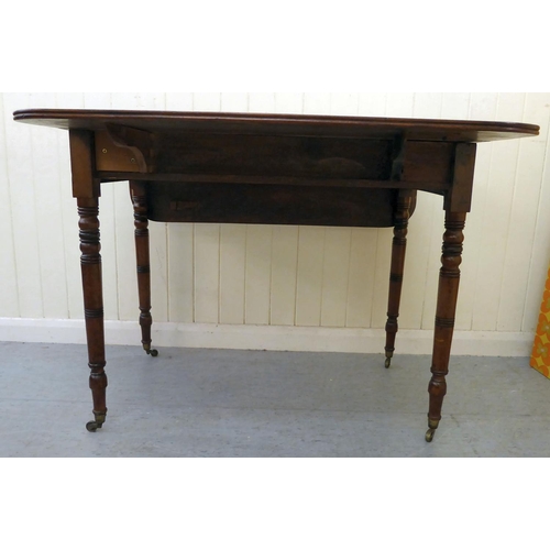 42 - A mid 19thC mahogany Pembroke table, raised on ring turned legs and casters  28