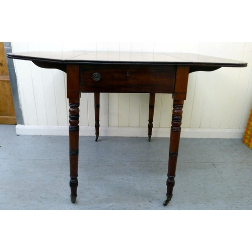 42 - A mid 19thC mahogany Pembroke table, raised on ring turned legs and casters  28