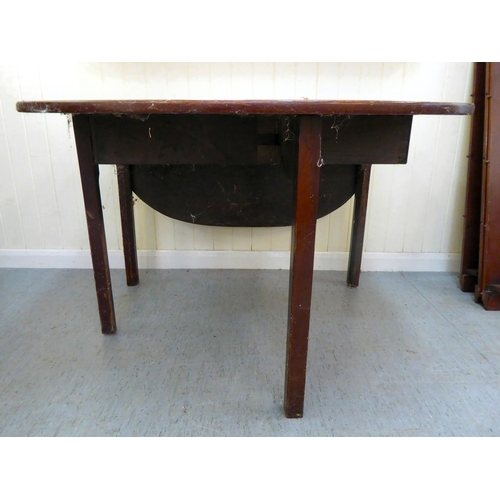 50 - A George III mahogany drop-leaf table, raised on square legs  28