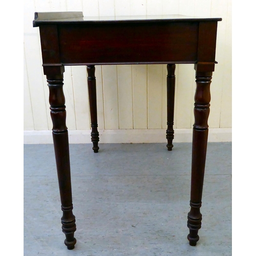 51 - A late 19thC mahogany two drawer side table, raised on turned legs  30