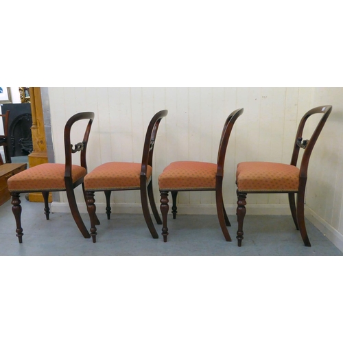 54 - A set of four late Victorian rosewood and mahogany framed, balloon and carved bar back dining chairs... 