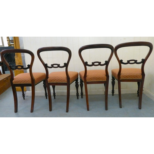 54 - A set of four late Victorian rosewood and mahogany framed, balloon and carved bar back dining chairs... 