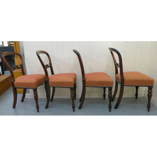 54 - A set of four late Victorian rosewood and mahogany framed, balloon and carved bar back dining chairs... 