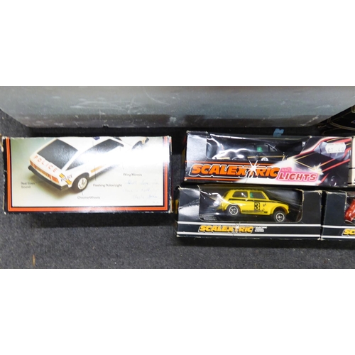 57 - Scalextric accessories, comprising track, transformer and cars