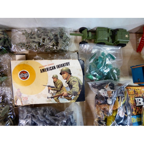 60 - Diecast lead and moulded plastic toy soldiers and animals: to include examples by Britains