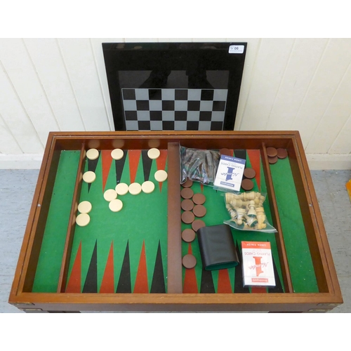 90 - Chessboard tables: to include a McIntosh teak example, raised on block legs  18