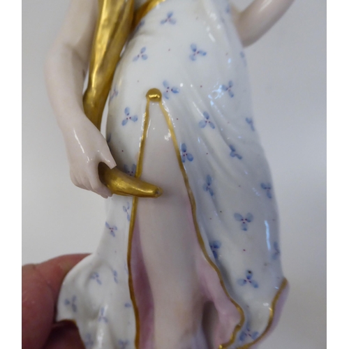 103 - A pair of mid 19thC Continental porcelain figures 'La Terre' and 'Le Feu'  each 8