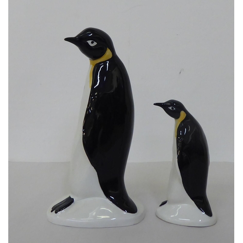 123 - Two Poole pottery model penguins  8.5