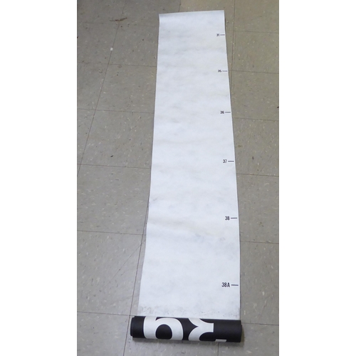 148 - Four printed paper, white on black bus route style rolls, featuring destinations and numbers