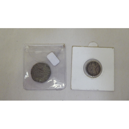 164 - Silver coins: to include a late Victorian shilling; and a bracelet