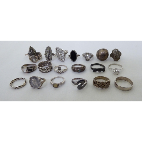 169 - Silver and white metal variously set rings  