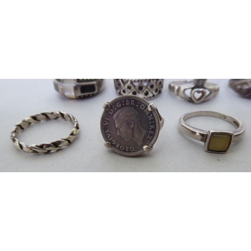 169 - Silver and white metal variously set rings  