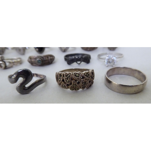 169 - Silver and white metal variously set rings  