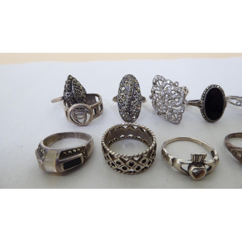 169 - Silver and white metal variously set rings  