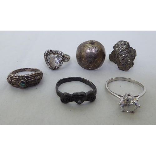 169 - Silver and white metal variously set rings  