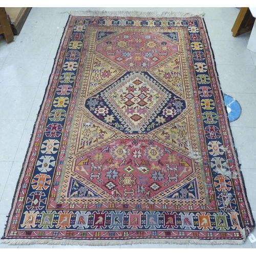 188 - A Kelim rug, decorated in geometric colours  23