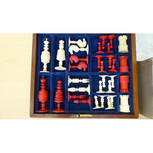 195 - Two chess sets, one wooden, one bone 