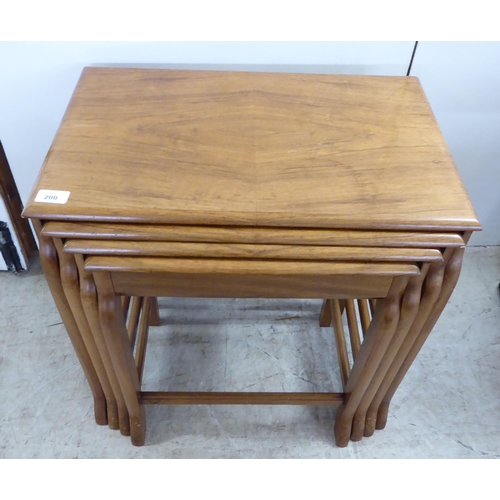 200 - A quartetto of modern teak occasional tables, raised on splayed legs  largest 21