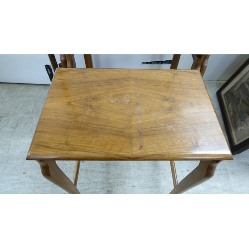 200 - A quartetto of modern teak occasional tables, raised on splayed legs  largest 21