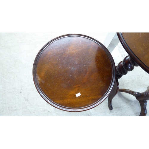 205 - Three dissimilar late 19th/early 20thC mahogany and oak pedestal tables, each raised on a tripod bas... 