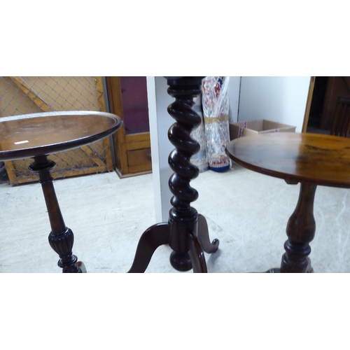 205 - Three dissimilar late 19th/early 20thC mahogany and oak pedestal tables, each raised on a tripod bas... 