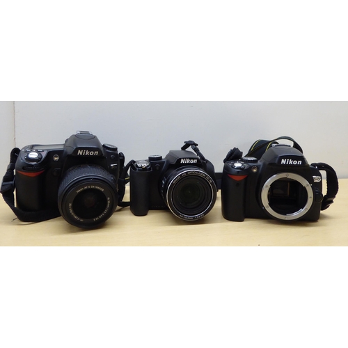 206 - Photographic and optical equipment: to include a Nikon D80 camera; and a pair of Tasco Zip 7x-15x 35... 