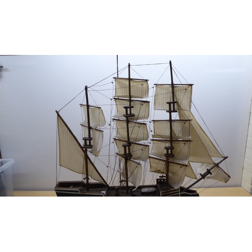 208 - A scratch built model sailing boat, on stand  32