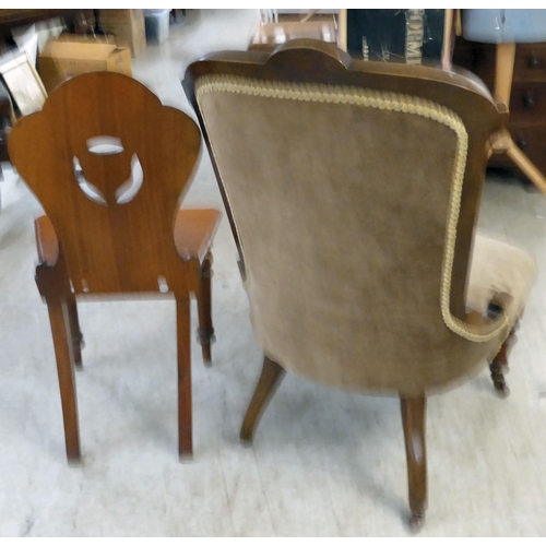 209 - Late Victorian/Edwardian mahogany furniture, viz. a nursing chair; a hall chair; and a stool