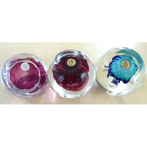 21 - Collectable glassware: to include individually, uniquely decorated paperweights with examples by Sel... 