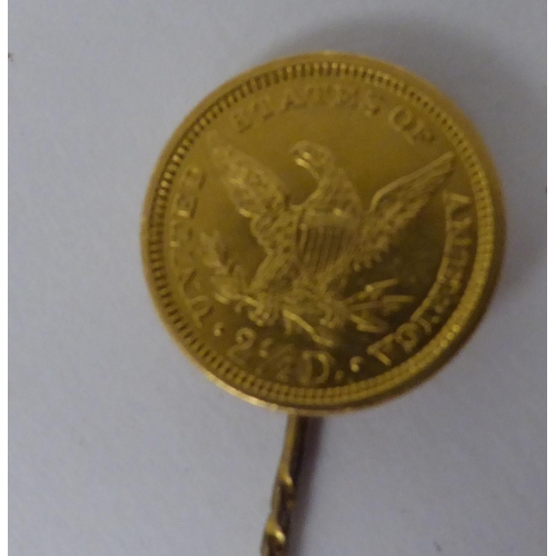 238 - A stick pin, set with a gold US 2.5 dollar coin  dated 1861