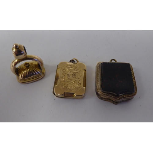 240 - Various yellow metal and other seals and lockets: to include one set with a bloodstone