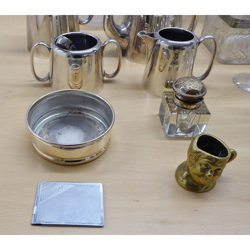 242 - Silver plate and glass tableware: to include decanters, serving items and a biscuit barrel 