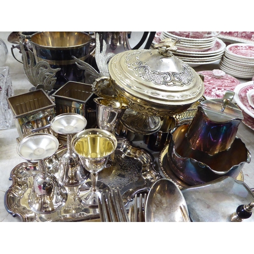 282 - Silver plated tableware: to include an ice bucket; and a bottle coaster 