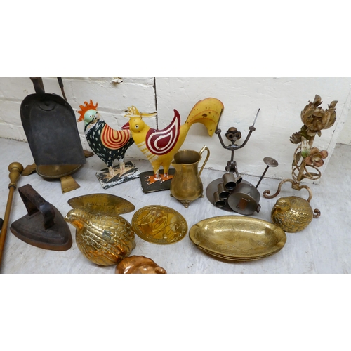 292 - Metalware, mainly 20thC: to include copper moulds; and plaques  mixed sizes