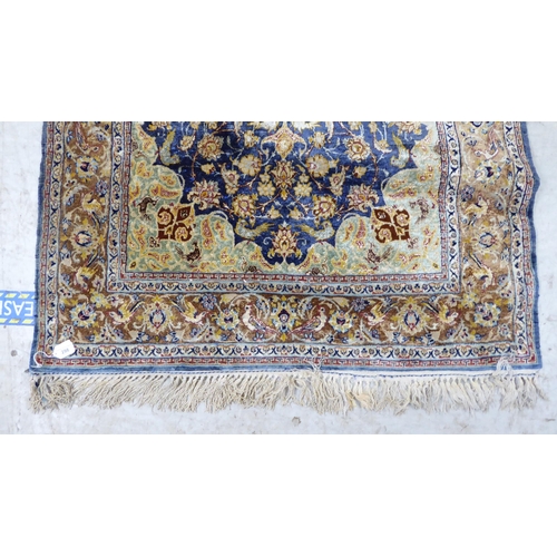 298 - A Persian part-woven silk rug, decorated with birds and flora, on a multi-coloured ground  42