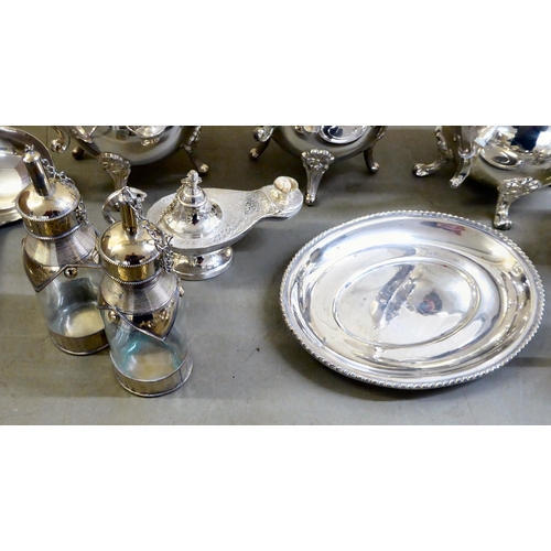 302 - Silver plated tableware: to include a five piece tea set; and flatware