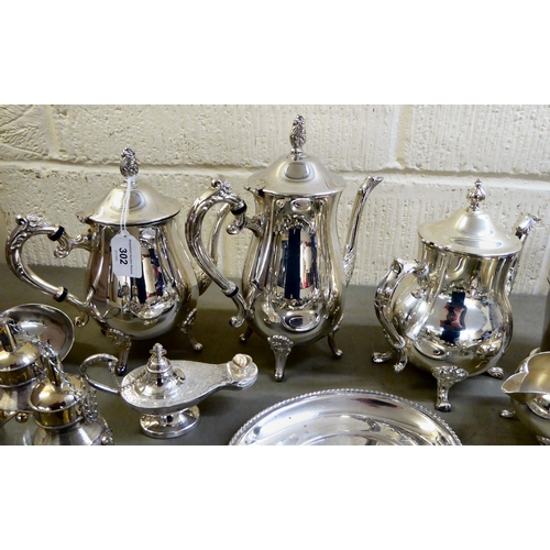 302 - Silver plated tableware: to include a five piece tea set; and flatware