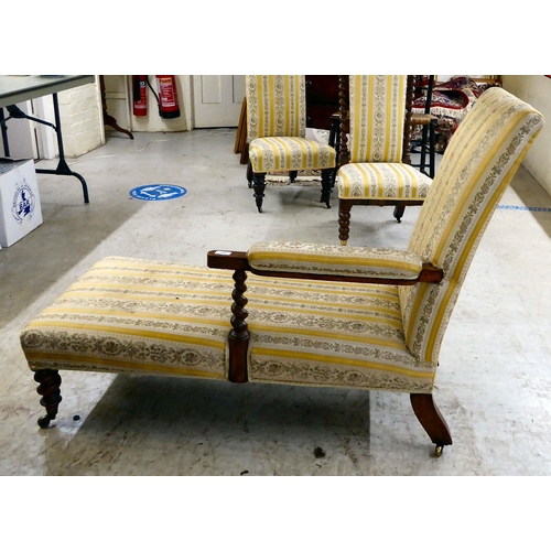 307 - An Edwardian mahogany showwood framed chaise longue with later two-tone, floral patterned fabric uph... 