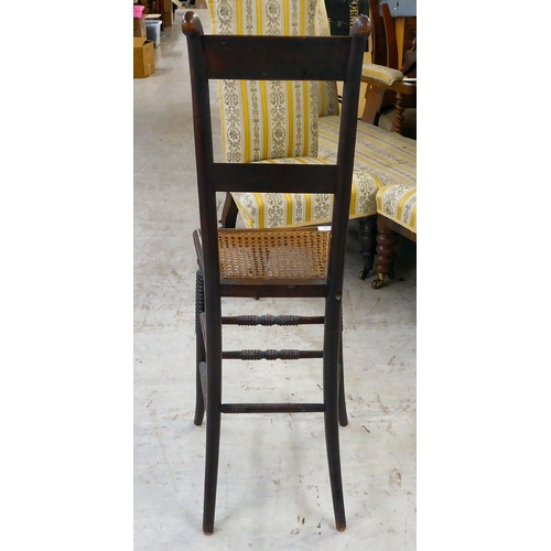 308 - A George III beach framed correctional chair