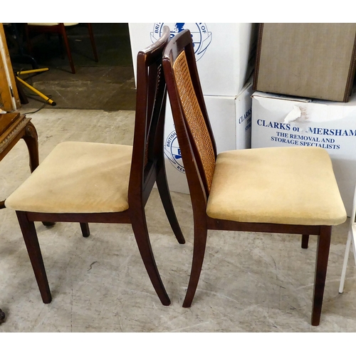 311 - Two G-Plan stained teak framed dining chairs, raised on square, tapered legs