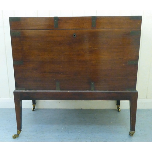 320 - A George III military design, brass bound mahogany and camphorwood chest with straight sides and a h... 